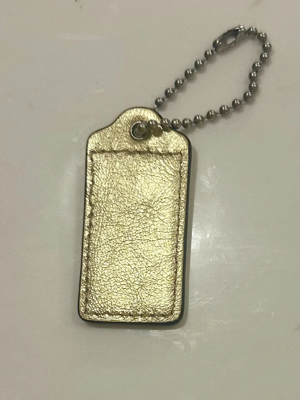 Coach gold leather